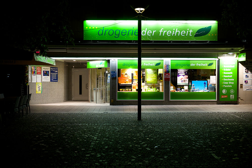 Drugstore of Freedom at night
